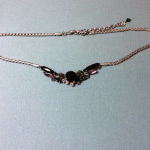 Rhinestone and crystal necklace on silver rope.